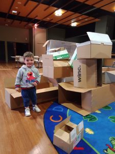 Building with cardboard boxes at "Not a box" storytime.