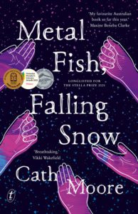 "Metal fish, falling snow" by Cath Moore